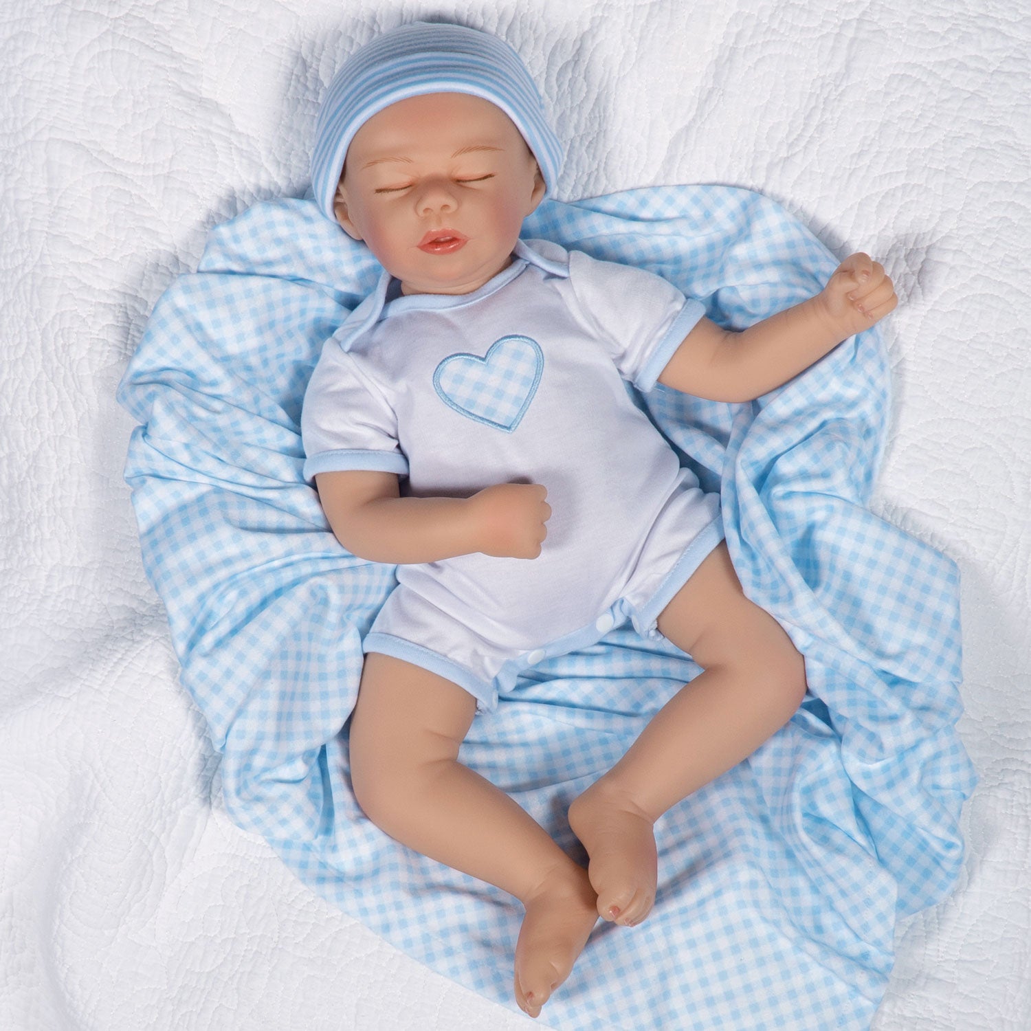 Swaddler Baby Checked Out - 18" Realistic Boy Doll by Reborn Artist, Michelle Fagan. Made in our exclusive SoftTouch Vinyl for an ultra-realistic feel!