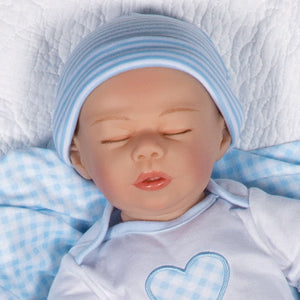 Swaddler Baby Checked Out - 18" Realistic Boy Doll by Reborn Artist, Michelle Fagan. Made in our exclusive SoftTouch Vinyl for an ultra-realistic feel!