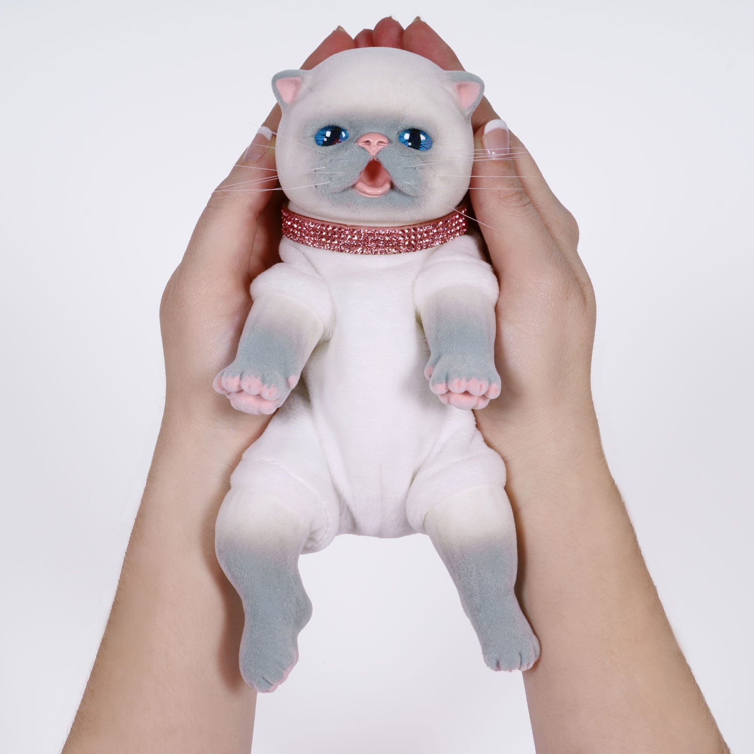 9-inch realistic Balinese Kitten doll, sculpted by world-renowned artist Ping Lau, the Furever Babies Kitten collection by PG is made from our premium vinyl that is flocked for a velvety finish and a weighted plush body for that wonderfully lifelike feel