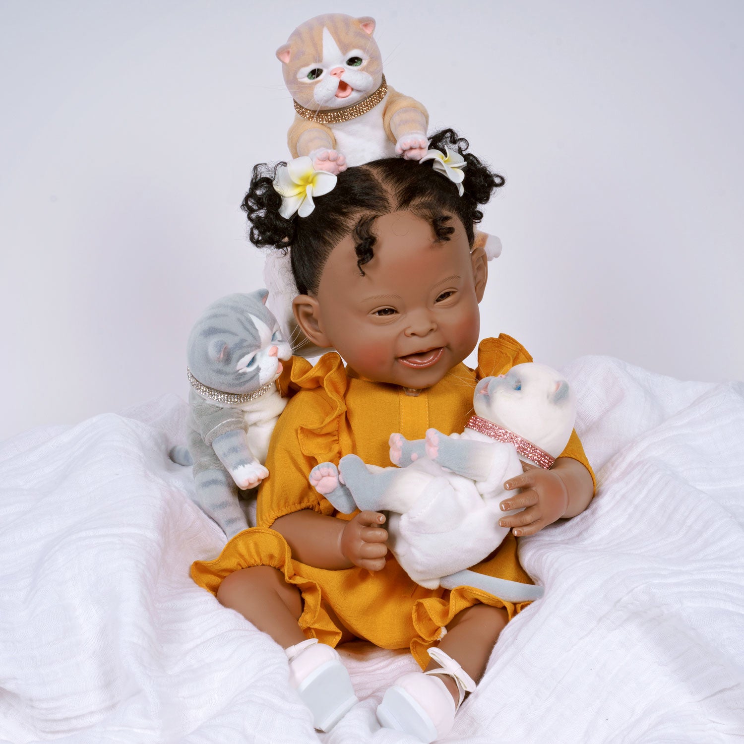 9-inch realistic Balinese Kitten doll, sculpted by world-renowned artist Ping Lau, the Furever Babies Kitten collection by PG is made from our premium vinyl that is flocked for a velvety finish and a weighted plush body for that wonderfully lifelike feel