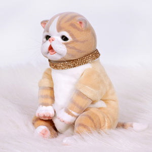 9-inch realistic Baby Orange Tabby Kitten doll inspired by an American Shorthair kitten. Sculpted by world-renowned artist Ping Lau, the Furever Babies Kitten collection by PG is made from our premium vinyl that is flocked for a velvety finish and a weighted plush body for that wonderfully lifelike feel