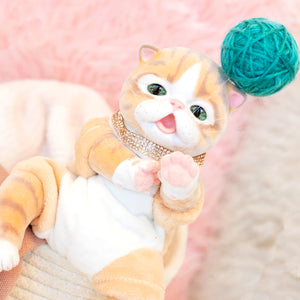 9-inch realistic Baby Orange Tabby Kitten doll inspired by an American Shorthair kitten. Sculpted by world-renowned artist Ping Lau, the Furever Babies Kitten collection by PG is made from our premium vinyl that is flocked for a velvety finish and a weighted plush body for that wonderfully lifelike feel