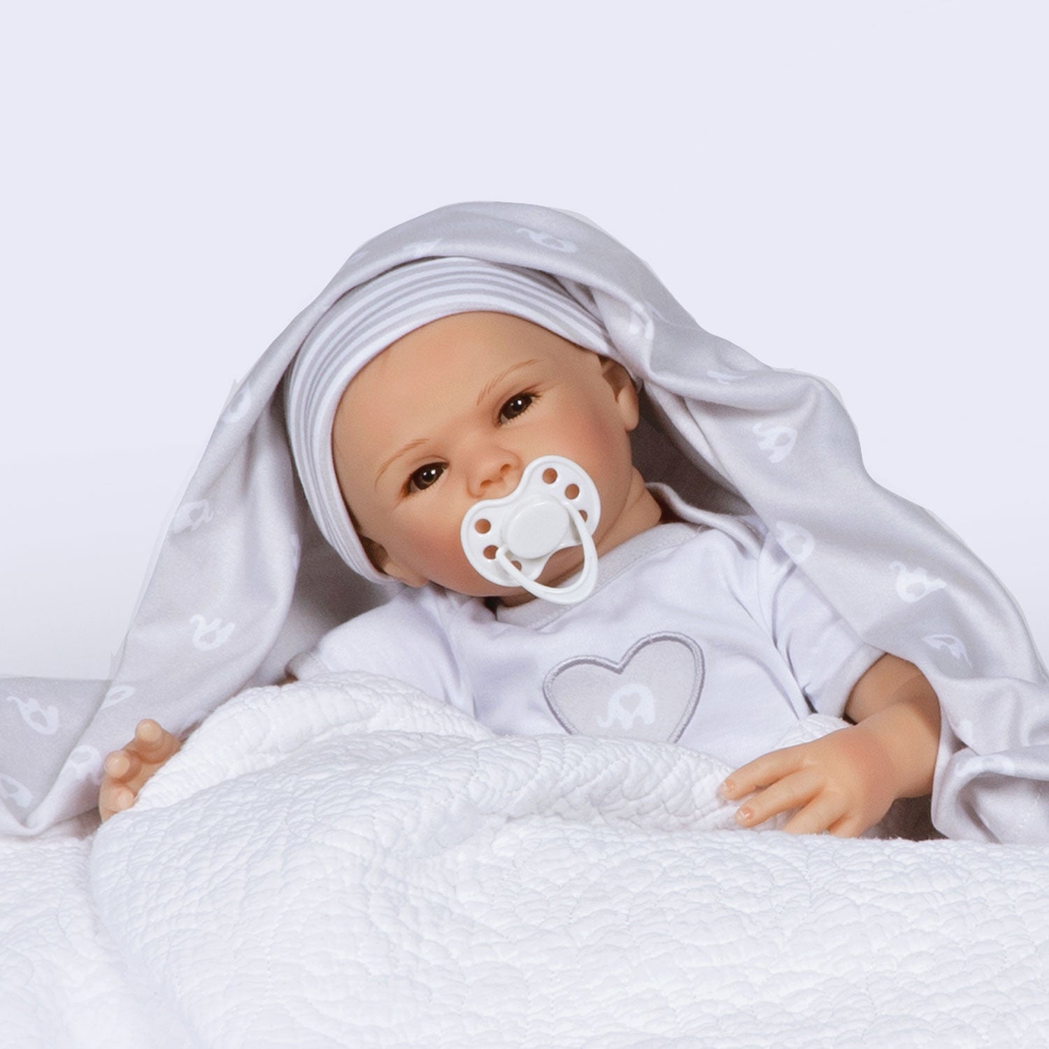 Swaddler Baby Little Elephant - 18" Realistic Doll by Reborn Artist, Michelle Fagan. Made in our exclusive SoftTouch Vinyl for an ultra-realistic feel!