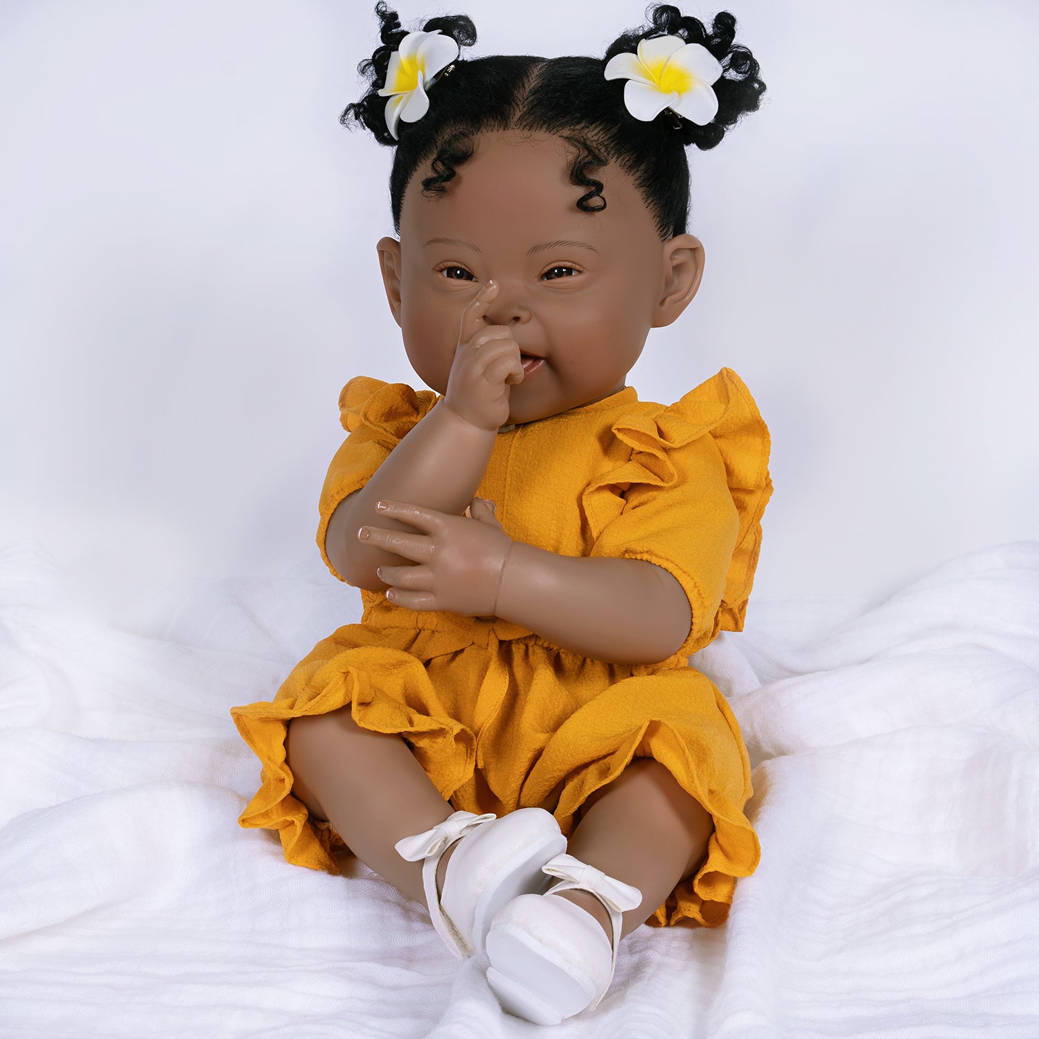 Emma for Down Syndrome Awareness - 21" Realistic Girl Doll by Reborn Artist, Lauren Faith Jaimes. Made in our exclusive GentleTouch Vinyl for an ultra-realistic feel!