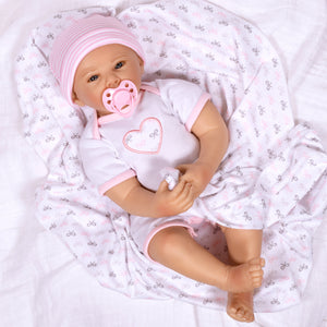 Swaddler Baby Bow Cute - 18" Realistic Doll by Reborn Artist, Michelle Fagan. Made in our exclusive SoftTouch Vinyl for an ultra-realistic feel!