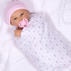 Swaddler Baby Bow Cute - 18" Realistic Doll by Reborn Artist, Michelle Fagan. Made in our exclusive SoftTouch Vinyl for an ultra-realistic feel!