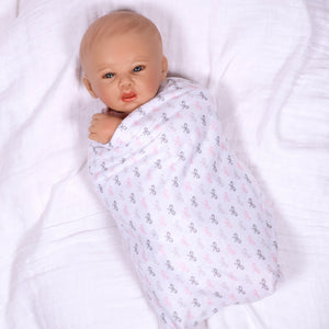 Swaddler Baby Bow Cute - 18" Realistic Doll by Reborn Artist, Michelle Fagan. Made in our exclusive SoftTouch Vinyl for an ultra-realistic feel!