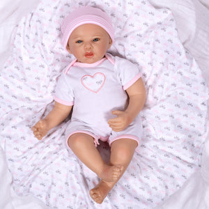 Swaddler Baby Bow Cute - 18" Realistic Doll by Reborn Artist, Michelle Fagan. Made in our exclusive SoftTouch Vinyl for an ultra-realistic feel!